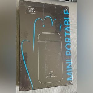 Mini portable water flosser